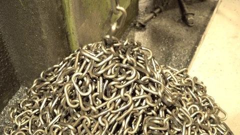 Chain that goes down automatically from the welding machine Stock Footage 107015337