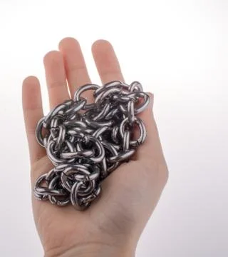 Chain in hand Stock-Fotos