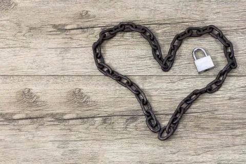 Chain heart shape with lock Stock Photos