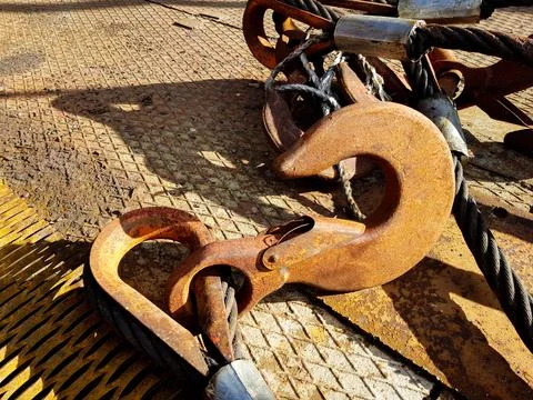 Chain hook of the tower crane for lifting cargo close-up. Rope slings close-up Stock Photos