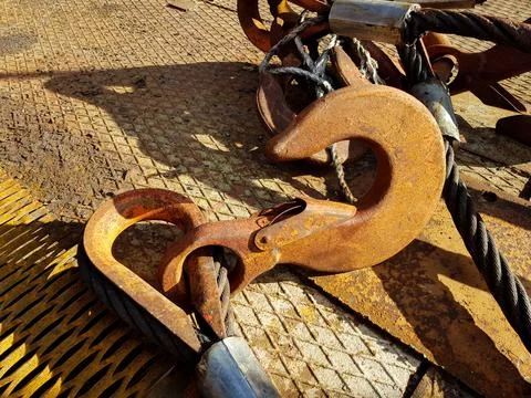 Chain hook of the tower crane for lifting cargo close-up. Rope slings close-up Stock Photos