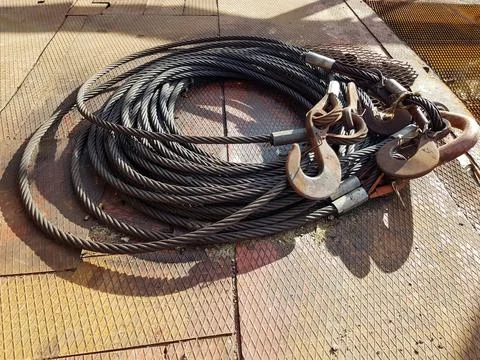 Chain hook of the tower crane for lifting cargo close-up. Rope slings close-up Stock Photos