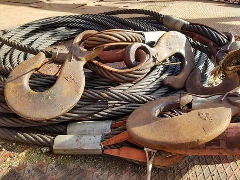 Chain hook of the tower crane for lifting cargo close-up. Rope slings close-up Stock Photos