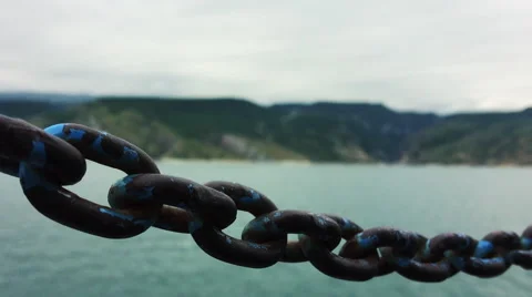 Chain on the lakeshore background. Stock Footage 53110890