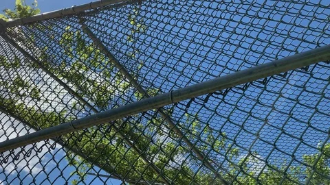 Chain link fence structure blue sky sunny Stock Footage 109089664