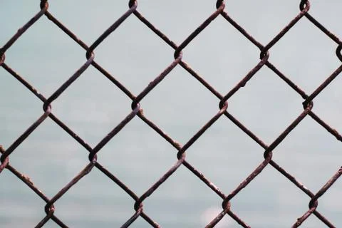 Chain-link fencing pattern. Stock Photos
