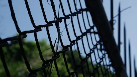 Chain Link Security Fence with Sharp Metal Spikes Stock Footage 327344214