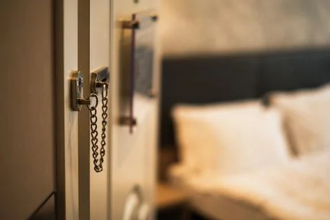 Chain lock on the door  Stock Photos