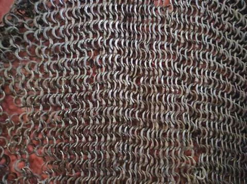 Chain mail texture. Old chain mail. Rusty texture of rings. Knights' clothi.. Stock Photos