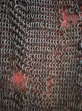 Chain mail texture. Old chain mail. Rusty texture of rings. Knights' clothi.. Stock Photos