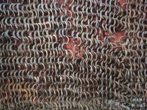 Chain mail texture. Old chain mail. Rusty texture of rings. Knights' clothi.. Stock Photos