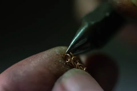 Chain making process. jewelry making. making a gold chain by a jeweler. repair Stock Photos