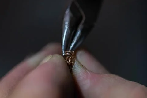 Chain making process. jewelry making. making a gold chain by a jeweler. repair Stock Photos
