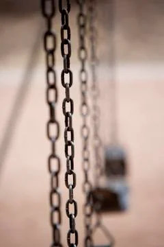 Chain on Playground Swing Stock Photos