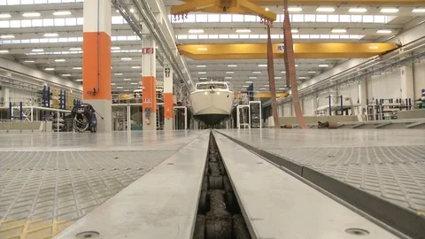 Chain pulls a boat in a shipyard Stock Footage 72143876