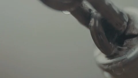 Chain rusty and wet close up Stock Footage 99880687
