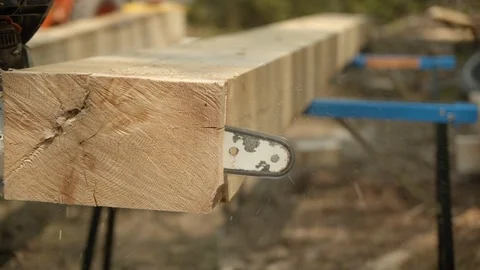 Chain saw cutting slow motion 4k board mill Stock Footage 109022445