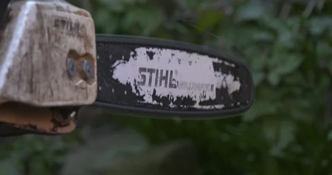 Chain saw Revs 4k Stock Footage 127597455