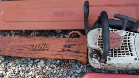 Chain saws lying side by side Stock Footage 314022006