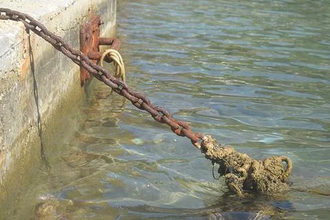 Chain for securing objects floating in the sea Stock Photos