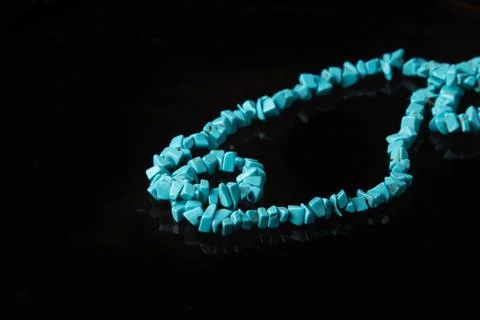 A chain of stone "turquoise." Stock Photos