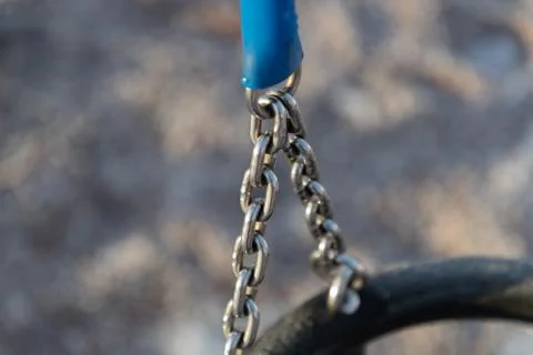 Chain on the swing close-up Stock Photos