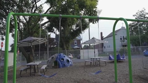 A chain swing for small children at a local kindergarten. Stock Footage 136447275