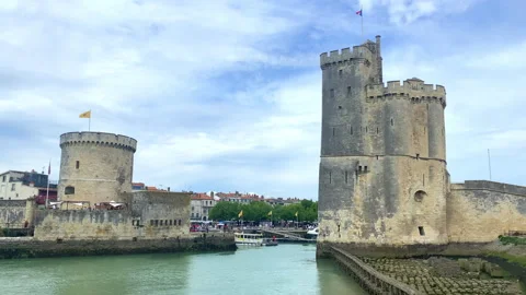 The Chain Tower and Saint-Nicolas Tower of the Old Port of La Rochelle Stock Footage 240416061