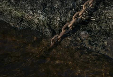 Chain in the water Stock Photos