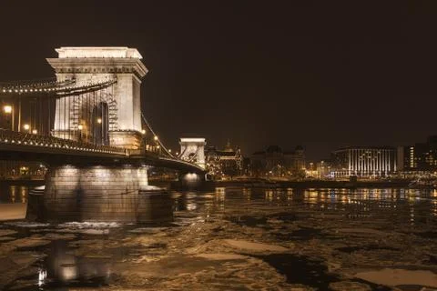 Chainbridge at nighttime with icy Danube Stock Photos