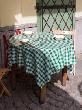 Chained Forks On A Table In Front of Cafe Tradycyjna In Wroclaw, Poland Stock Photos