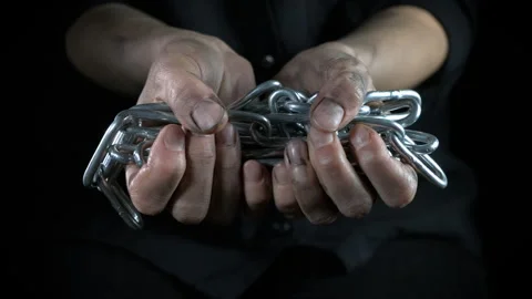 Chained hand at equality problems. Stock Footage 307866454