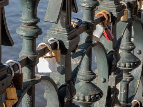 Chained padlocks on the Lover's Bridge in Prague Stock Photos