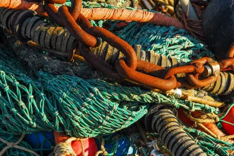 Chains and fish trawl Stock Photos
