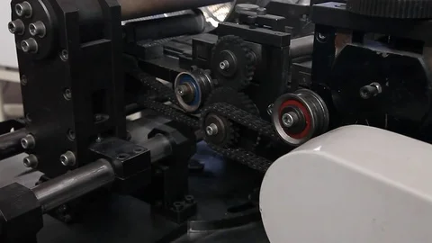 Chains and gears (filter production machine) Stock Footage 83874420