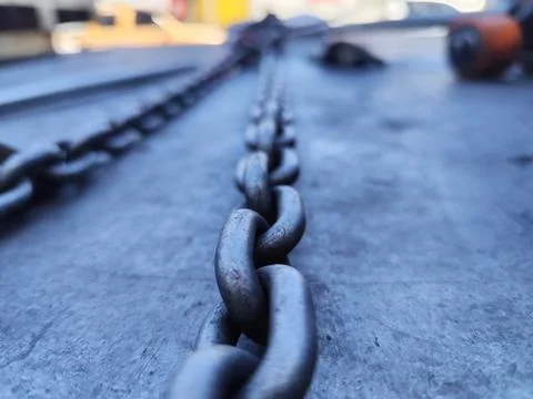 Chains for dragging, pulling or lifting heavy objects. Stock Photos