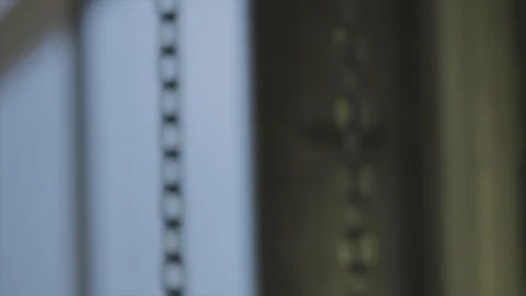 Chains of a Garage Door Move Quickly HD Video Stock Footage 92030142