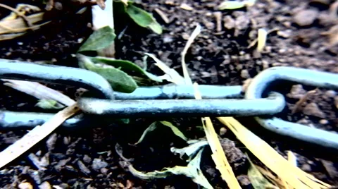 Chains on ground close up 動画素材 1072249