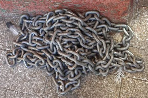 Chains at pavement Stock Photos