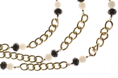 Chains with stones on a white background Stock Photos