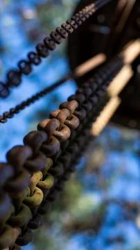 Chains stuck down and the background blurred. Stock Photos
