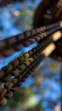 Chains stuck down and the background blurred. Stock Photos