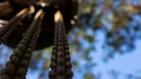 Chains stuck down and the background blurred. Stock Photos