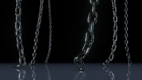 Chains suspended over a reflective surface, swaying in slow motion. Video stock 117092729
