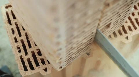 Chainsaw is cutting brick Stock Footage 58264349