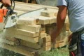 Chainsaw Cutting Lumber Footage