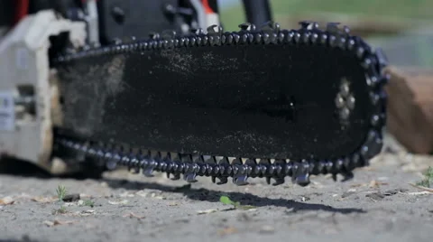Chainsaw on the ground close-up Stock Footage 59368253