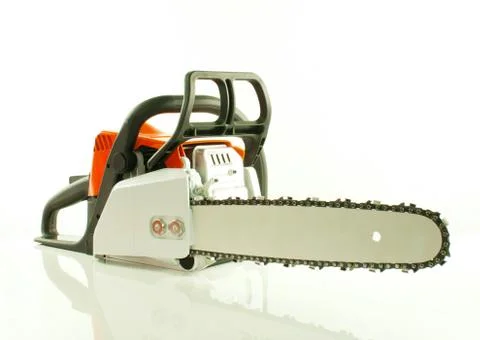 Chainsaw over the white background Stock Photos