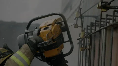 Chainsaw Sparks Fly During Snow Storm Stock Footage 137601600