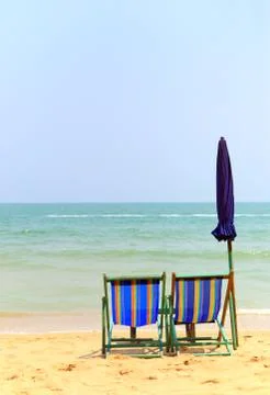Chair on the beach Stock Photos